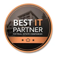 Best IT Partner badge for real estate companies, featuring modern buildings and recognition for outstanding IT services tailored for the real estate sector.